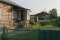 A village in Russia in summer, an original old wooden village house, an original authentic disappearing village life. Rural landsc