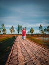 A village sceninc route with a walking man Royalty Free Stock Photo