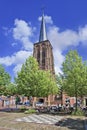 Village square with ancient brick church, Netherlands