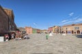 Village square on Burano island, near Venice, Italy.