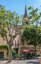 Village square and church of Villars in Provence