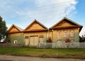 Village street in summer. Historical wooden house. Visim, Russia