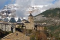 The Village Torla (Pyrenees) next to the snowy mountains Royalty Free Stock Photo