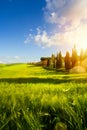 village in tuscany; Italy countryside landscape with Tuscany rolling hills ; sunset over the farm land Royalty Free Stock Photo