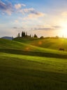 village in tuscany; Italy countryside landscape with Tuscany rolling hills ; sunset over the farm land Royalty Free Stock Photo