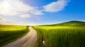 village in tuscany; Italy countryside landscape with Tuscany rolling hills ; sunset over the farm land and country road Royalty Free Stock Photo