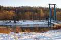 Village Vasilyevskoye, Russia - December 06, 2020: suspension foot bridge over Moskva Moscow River Royalty Free Stock Photo