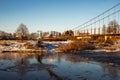 Village Vasilyevskoye, Russia - December 06, 2020: suspension foot bridge over Moskva Moscow River Royalty Free Stock Photo