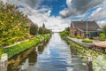 Village view from Grote Brug, a drawbridge in Langeraar, across the Leidse Vaart Royalty Free Stock Photo