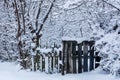 Winter Wonderland: A Snow-Covered Village Fence Royalty Free Stock Photo