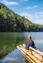 Villager fishing on reservoir in sunny at pang oung