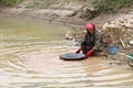 Villager panning gold