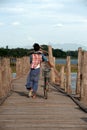 Villagers bike trailers on U-bein Bridge,Myanmar.