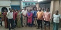 Villagers in India in a village standing after meeting .