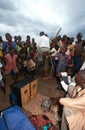 Villagers listening to pedal-powered radio, Uganda