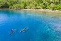 Aerial View of Outrigger Canoes Near Island in Papua New Guinea