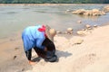 Villagers panning gold Royalty Free Stock Photo