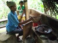 Villagers processing coffee beans at Satria Agrowista plantation, Tampaksiring, Indonesia