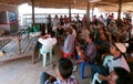 Villagers watching TV in Cambodia