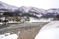 Villages of Shirakawago and Gokayama are one of Japan`s UNESCO World Heritage Sites. Farm house in the village and mountain behin Royalty Free Stock Photo