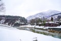 Villages of Shirakawago and Gokayama are one of Japan`s UNESCO World Heritage Sites. Farm house in the village and mountain behin Royalty Free Stock Photo