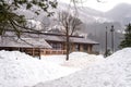 Villages of Shirakawago and Gokayama are one of Japan`s UNESCO World Heritage Sites. Farm house in the village and mountain behin Royalty Free Stock Photo