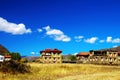 Villages under the blue sky and white clouds