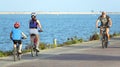 Villananitos beach, Lopagan, Spain, August 10, 2019: A pathway along salt flats, where people ride their bikes over the bike lane