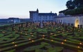VILLANDRY CASTLE, FRANCE - JULY 07, 2017: The garden illuminated by 2,000 candles at dusk . Nights of a Thousand Lights at Royalty Free Stock Photo