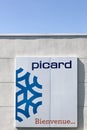 Picard logo on a wall