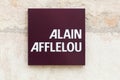 Alain Afflelou logo on a wall