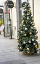 Villeneuve-Loubet , France 01.12.2020 Golden and Silver color of Christmas ball on the branches fir , Decorated Christmas tree. Royalty Free Stock Photo