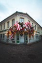 19.12.2021 - Vilnius. Christmas decoration of a candy shop in the streets of the Lithuanian capital. Giant lollipops, mistletoe