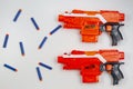 Vilnius, Lithuaania - March 5, 2019: Nerf N-Strike Elite Stryfe Blaster and Refill Bullet Darts on white background