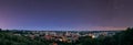 Vilnius, Lithuania. Amazing Night Starry Magic Sky Above Historic Center Cityscape. Old Town Travel Panorama In Royalty Free Stock Photo