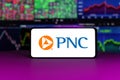 PNC financial service group on stock market index in front of stock market charts background Royalty Free Stock Photo