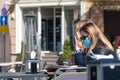 Two girls with masks sitting at the table Royalty Free Stock Photo