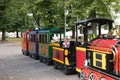 VILNIUS, LITHUANIA - August 24: Children being taken on a ride on a tourist train in the park with the driver in mask