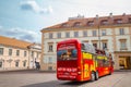 City tour sightseeing bus at Simonas Daukantas Square in Vilnius, Lithuania Royalty Free Stock Photo