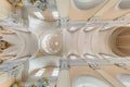 interior dome and looking up into a old gothic uniate church ceiling