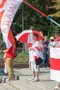 Peaceful protest supporting Belarus against ongoing repressions and call for free with red and white flag