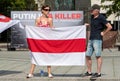 Peaceful protest supporting Belarus against ongoing repressions and call for free with red and white flag