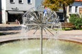 Working ball-shaped fountain during the summer day