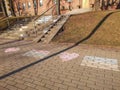 Vilnius, Lithuania. 28.02.2022. Drawings in chalk of the Lithuanian and Ukrainian flags are made by children in front of