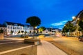 Vilnius Lithuania. Evening View Of Illuminated Didzioji Street With Red Motion Blur Effect On Road