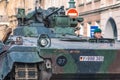 Armored crawler tank with cannon and female soldier