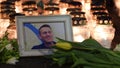 Flowers and candles laid at spontaneous memorial for Russian opposition leader Alexei Navalny