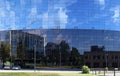 The huge glass walls of the modern office building with a BREE Royalty Free Stock Photo