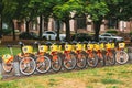 Vilnius, Lithuania. Row Of Colorful Bicycles AVIVA For Rent At Municipal Bike Parking In Street. Summer Day After Rain Royalty Free Stock Photo