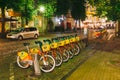 Vilnius, Lithuania. Row Of Colorful Bicycles AVIVA For Rent At Municipal Bike Parking In Street Royalty Free Stock Photo